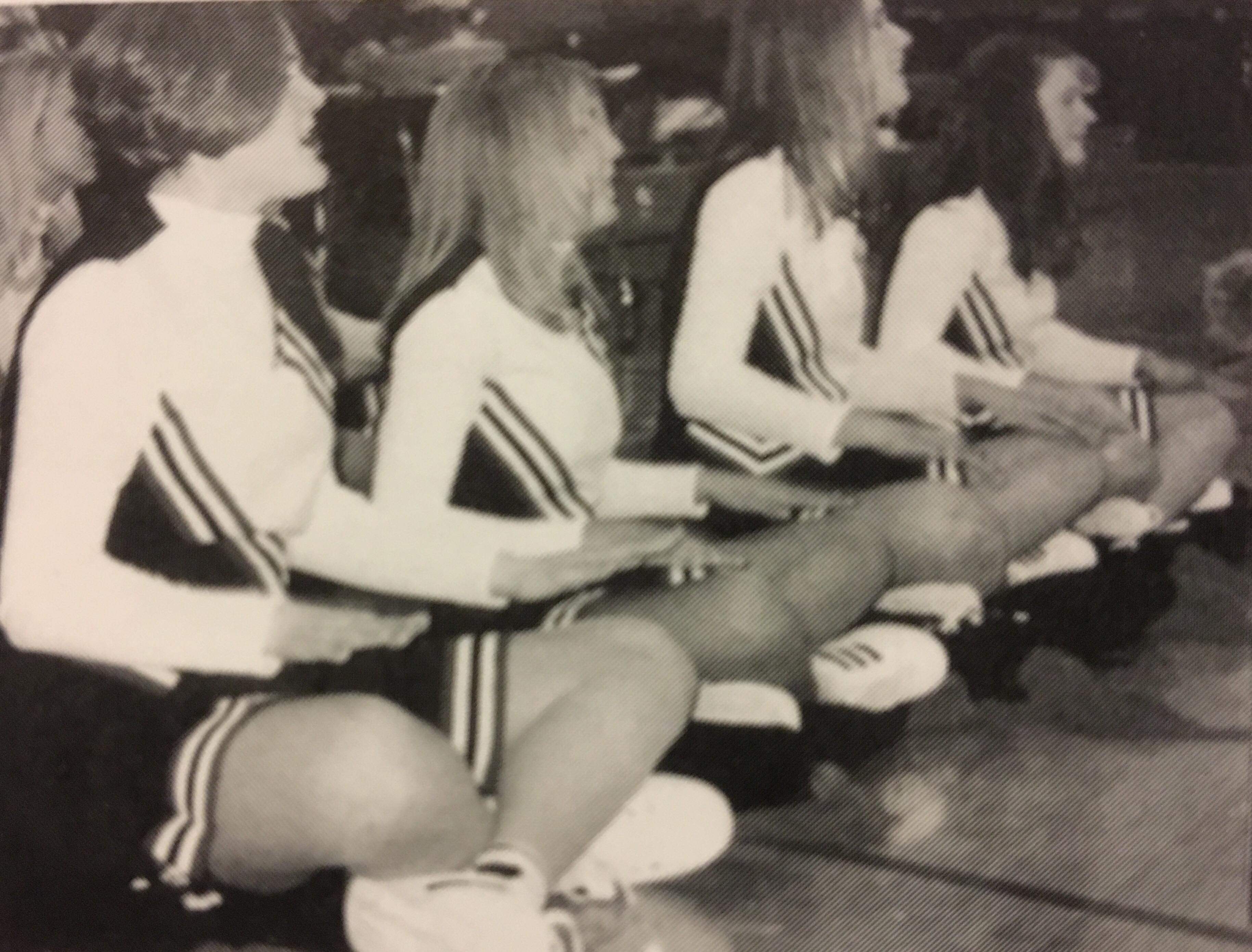Norse Cheerleaders in Action (L to R): Elizabeth Hauser, Shannon Paulson, Alyssa Glanzman, and Leslie Back.