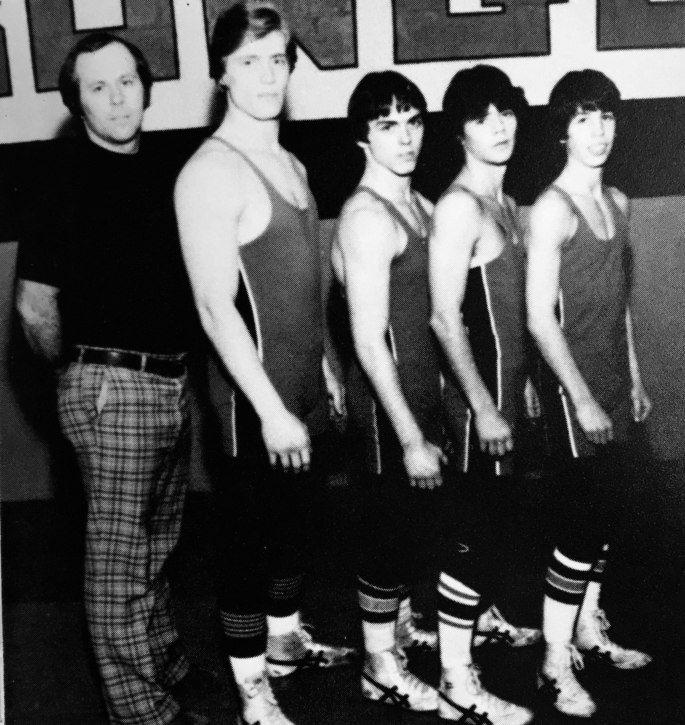 Coach Walek and the Seniors left to right: Coach Walek, Roger Bautch, Gary Steinke, Al Phillipson and Dave Gardner.