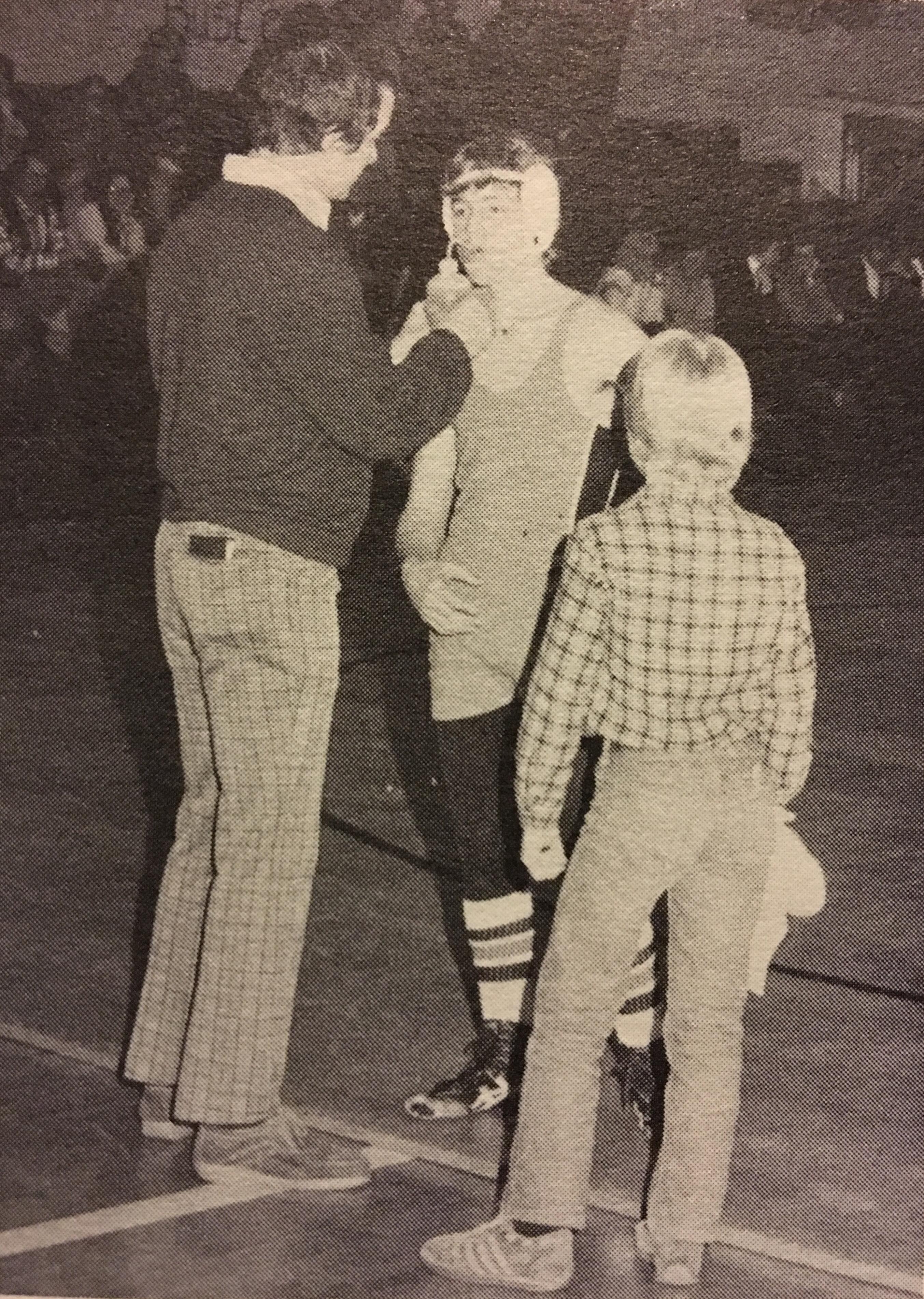 Coach Warrick with Ed Slaby as cornerman "Huck" Koxlien Looks on.