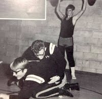 Mel Nelson (Bottom) sparing with Ron Berg.  John Dubiel waiting his turn, lifting.