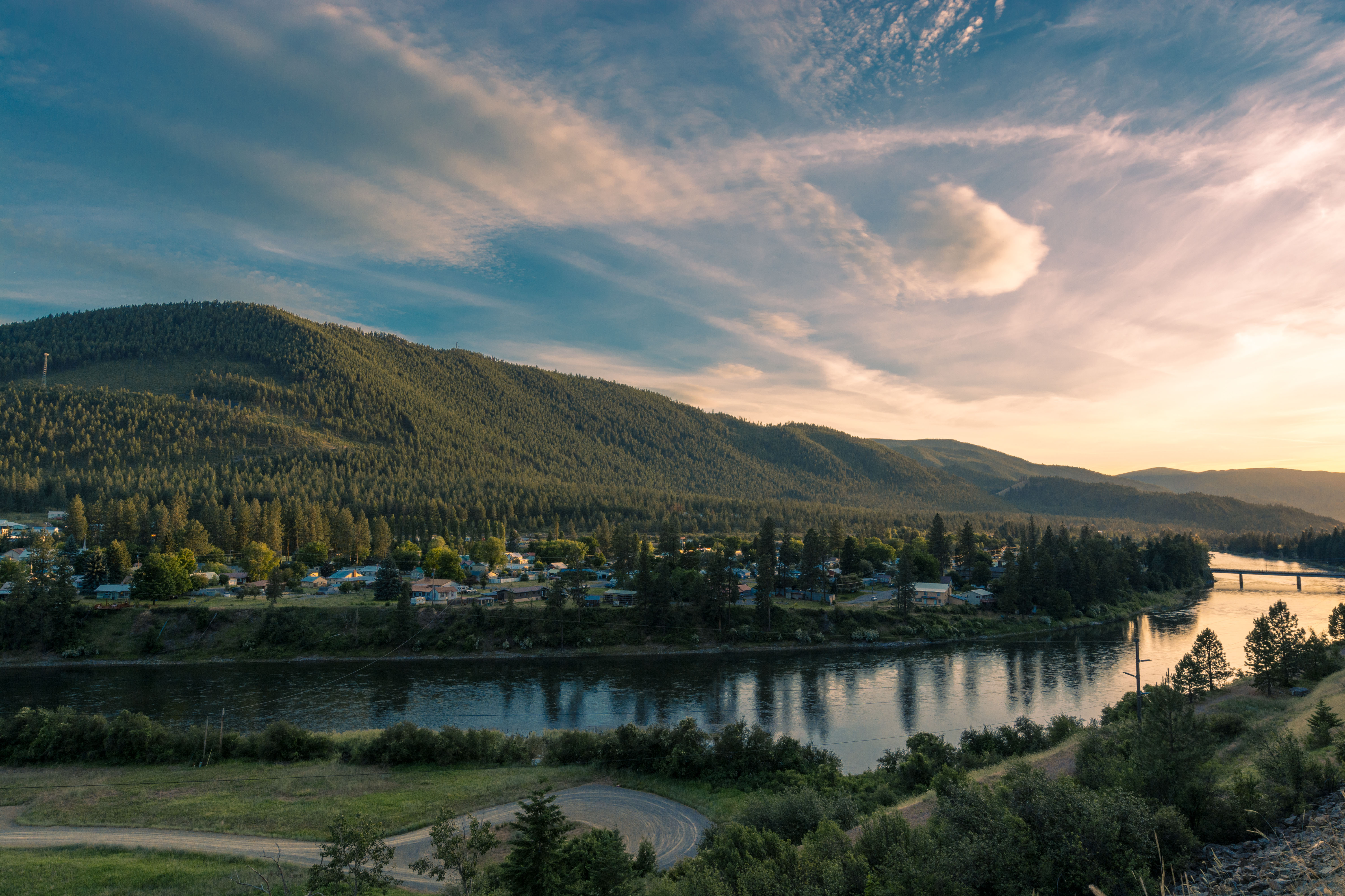 Nature in Superior, Montana; trees, sunset on an open sky