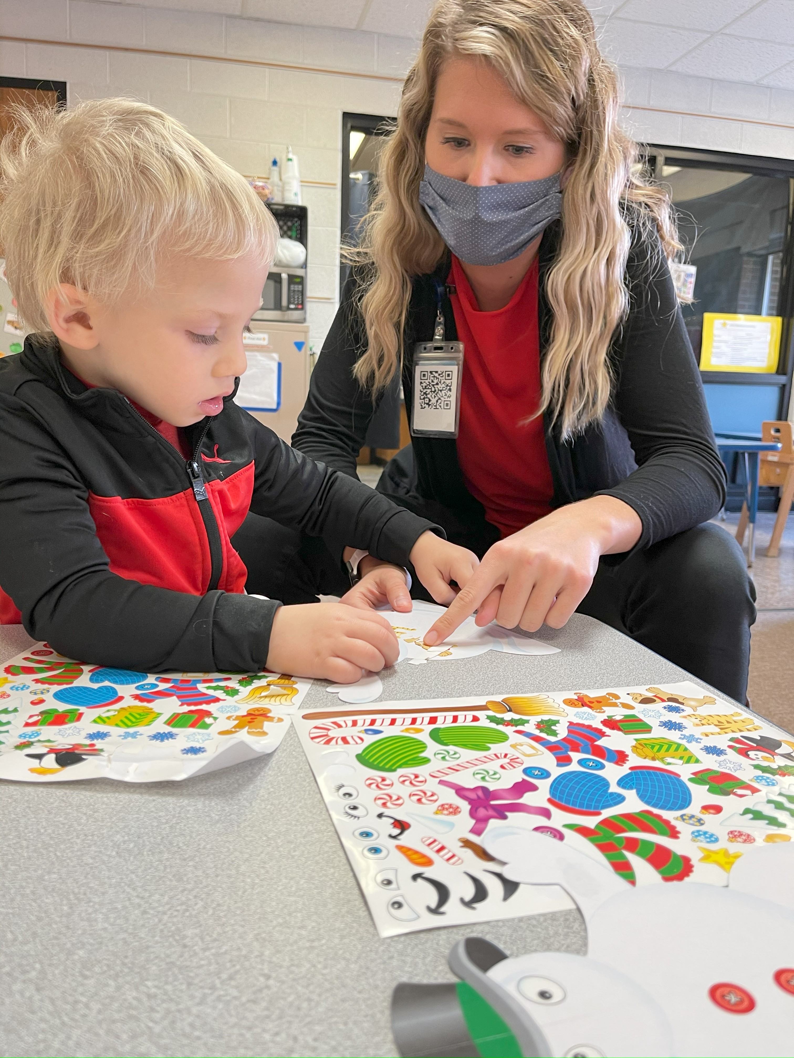 Student working with staff