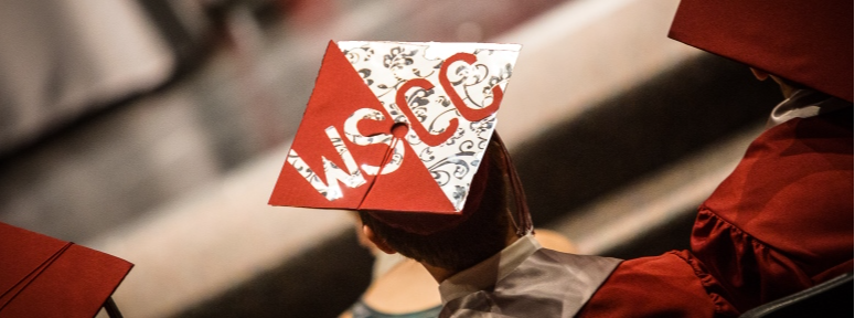 wscc written on a graduation cap