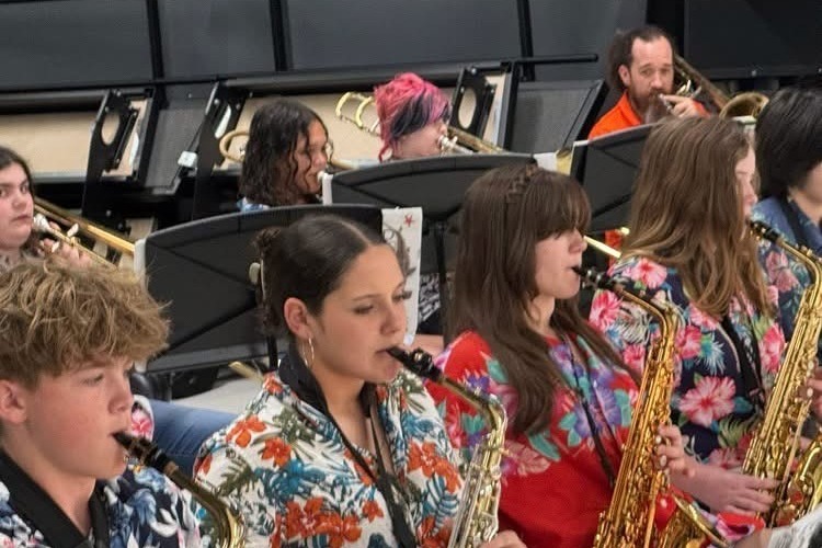 Jazz band students playing their instruments.