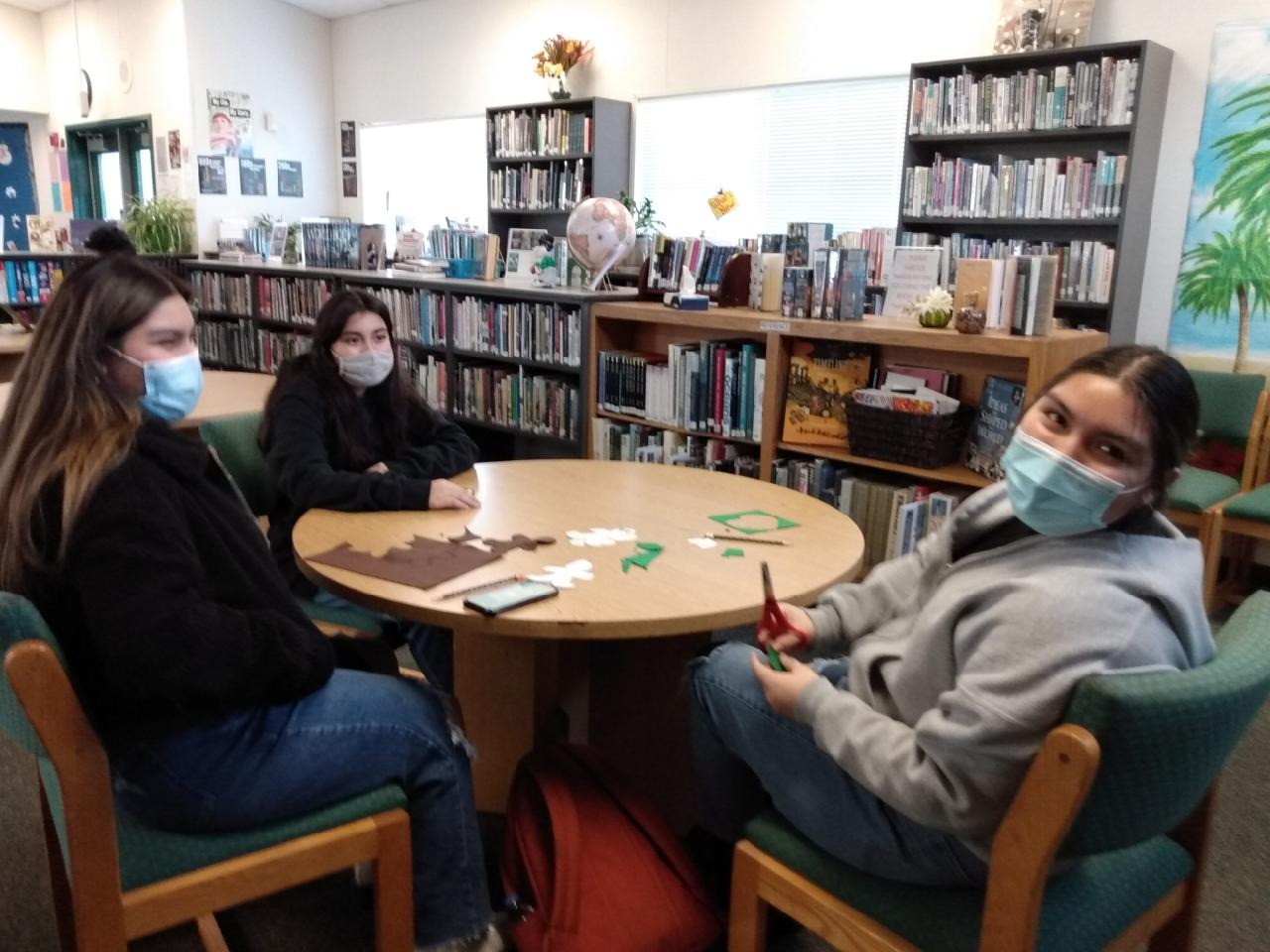 3 Students in the Library