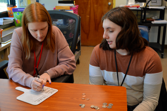 Student working in classroom.