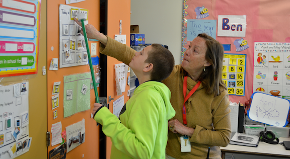 Teacher and Student working at PMS