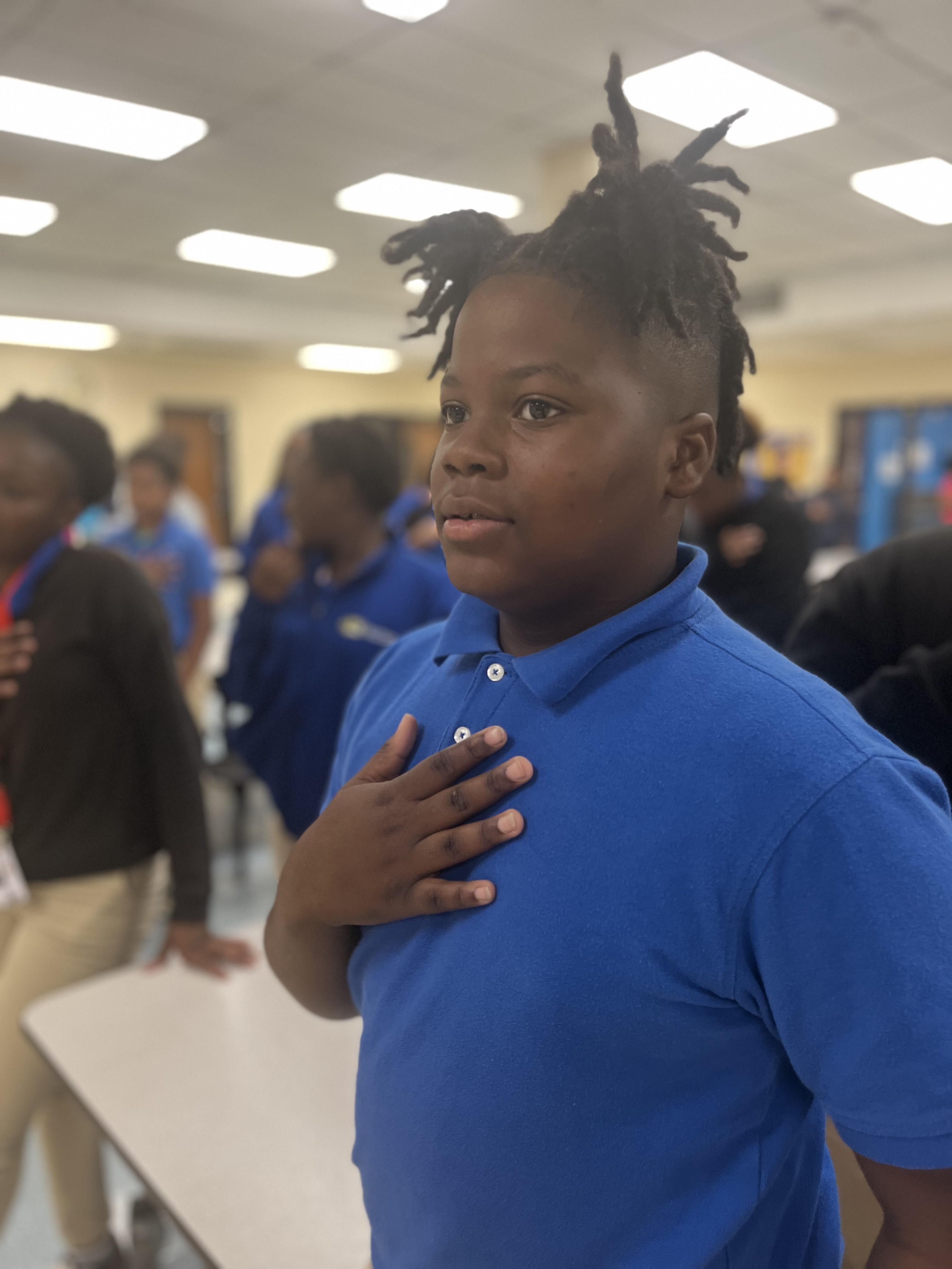 A child is saying the pledge