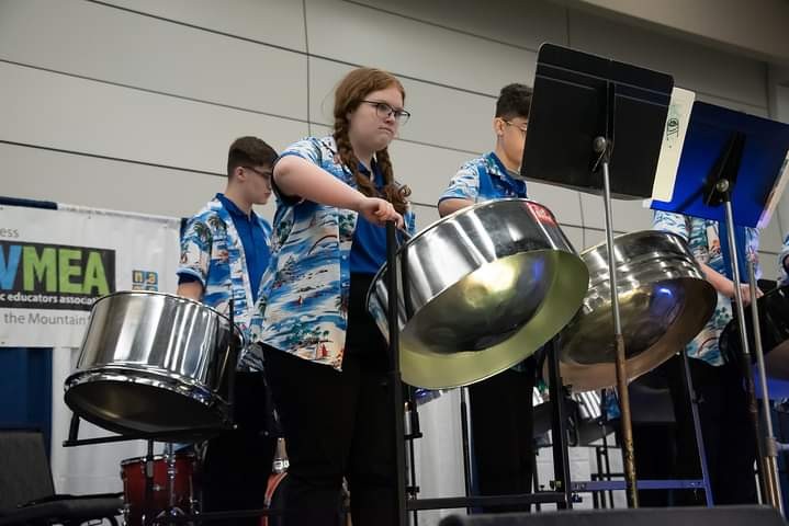 student playing steel drum