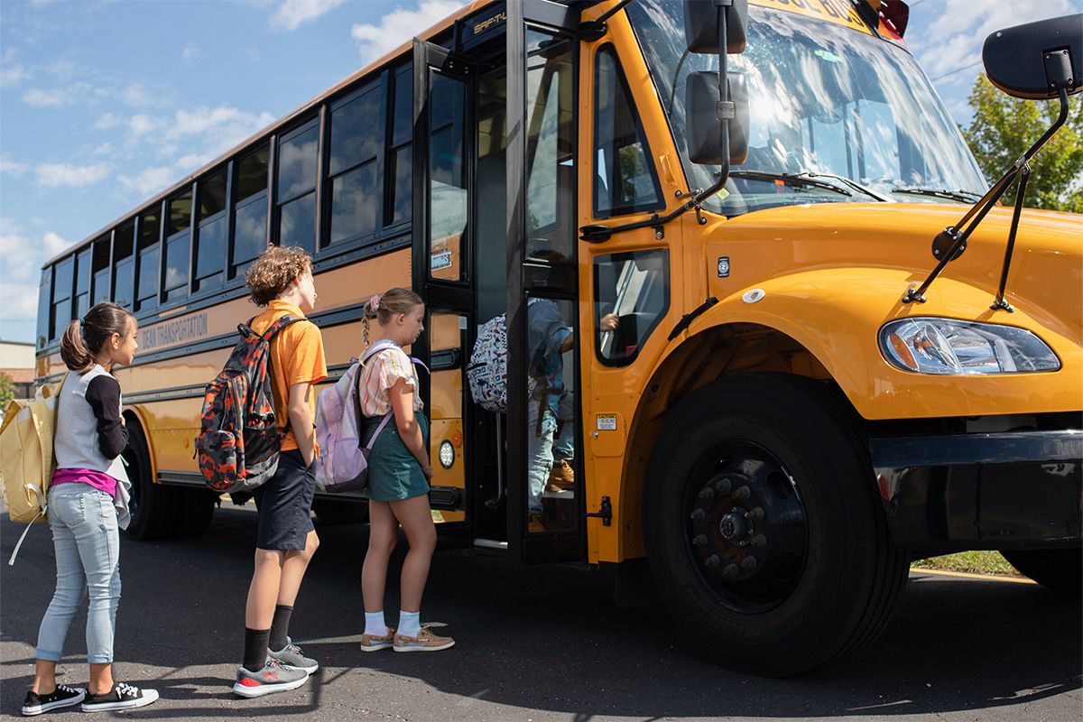 children  entering school bus