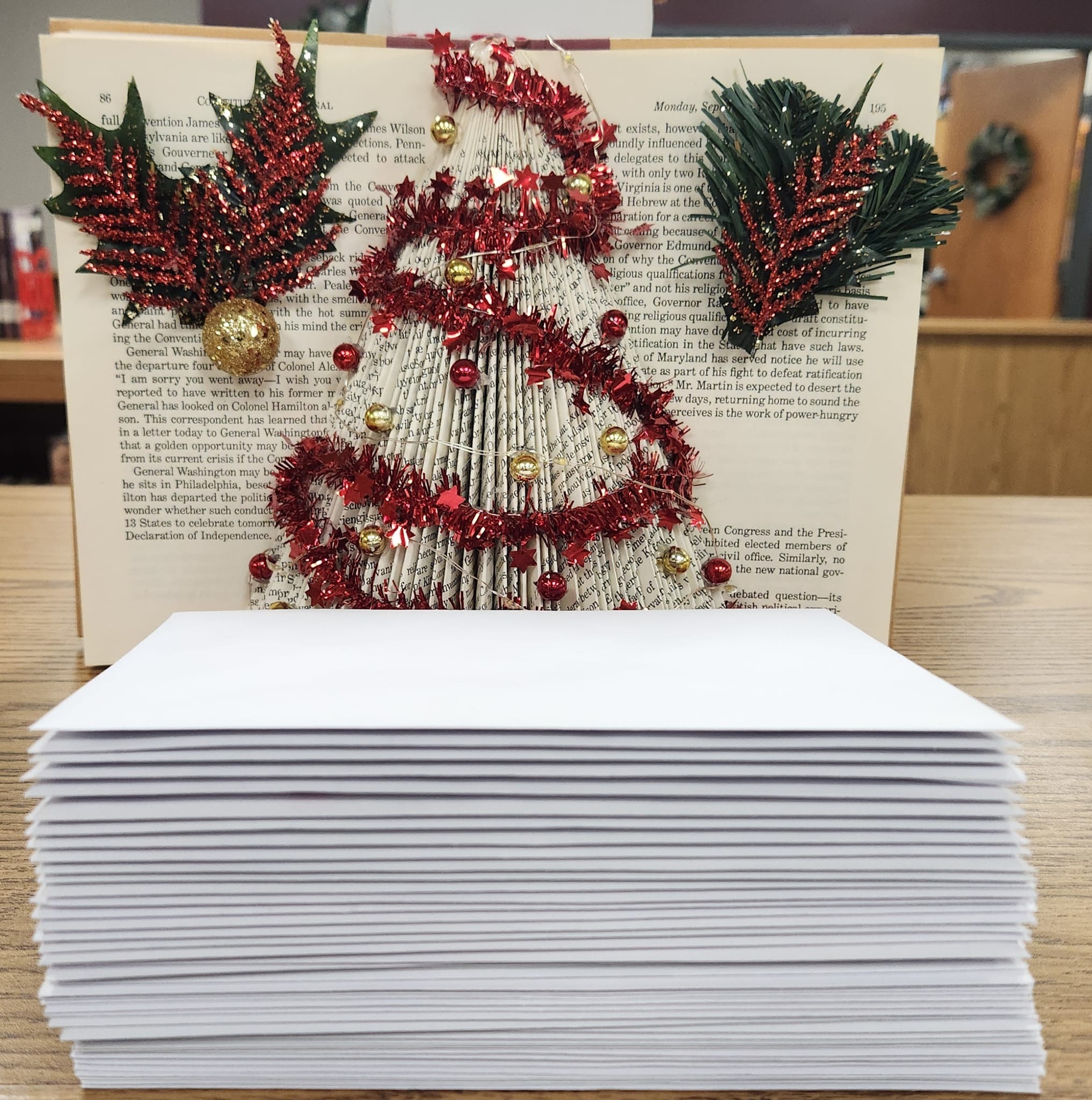 stack of Christmas cards in envelopes