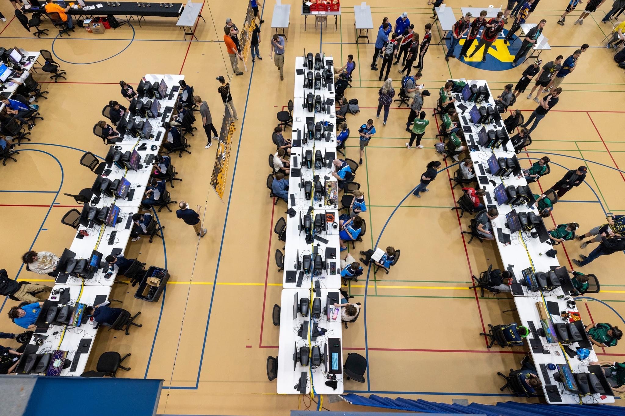 tables with computers in a gym