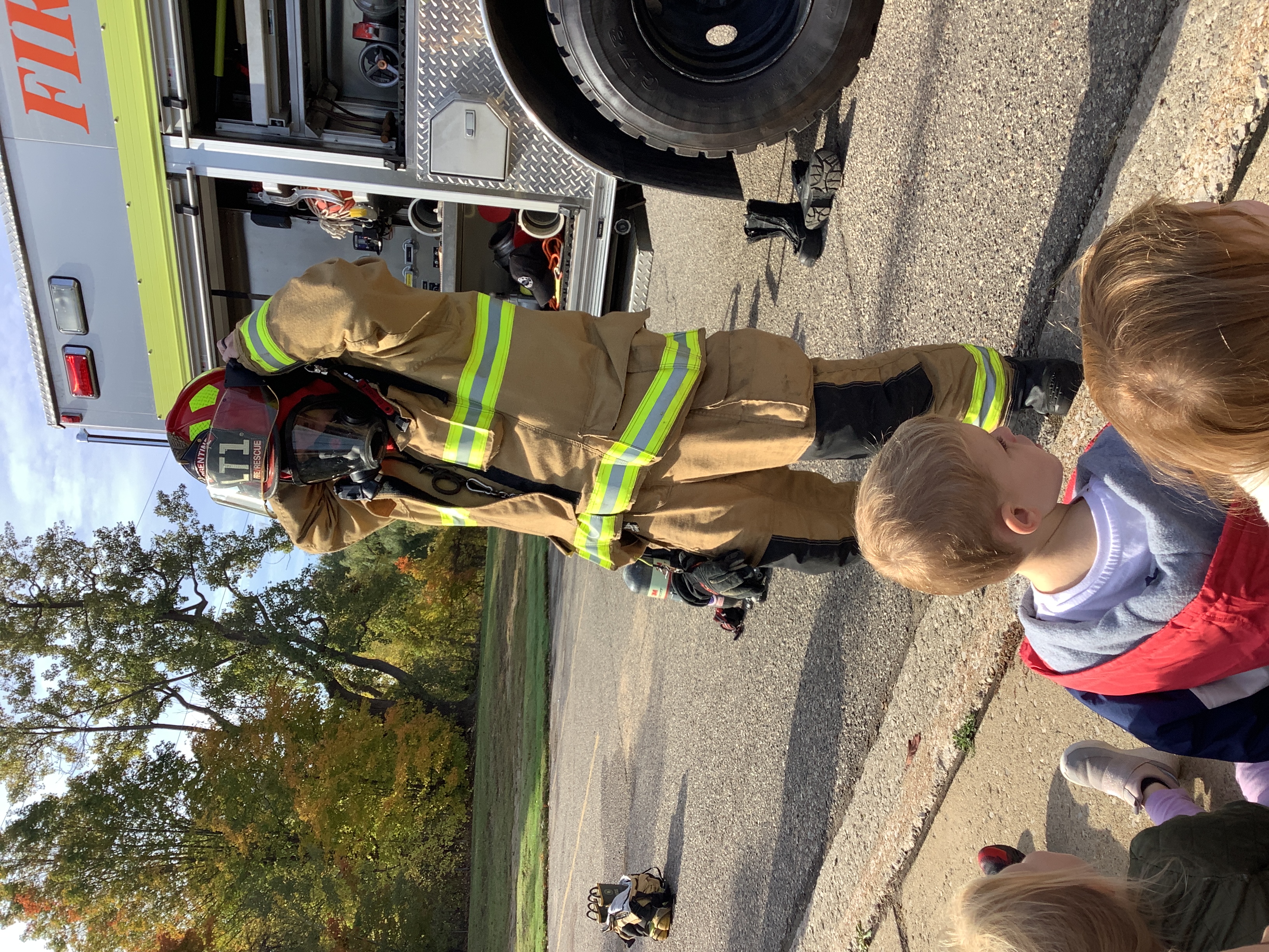 Argentine firefighters visit preschool. Children learn about fire safety and walk through a fire truck!
