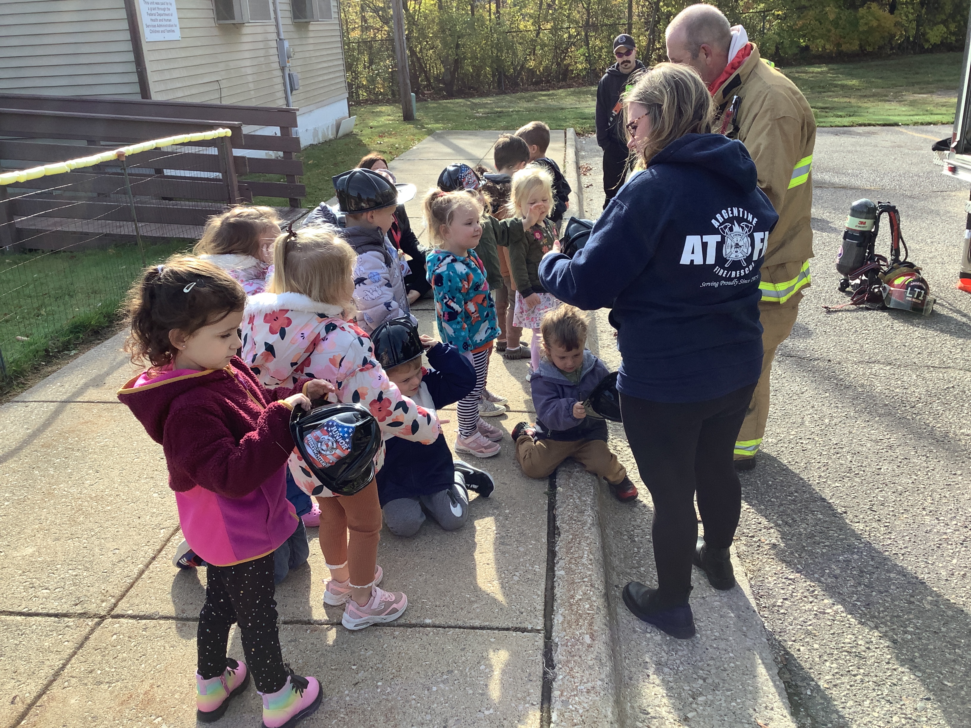 Argentine firefighters visit preschool. Children learn about fire safety and walk through a fire truck!