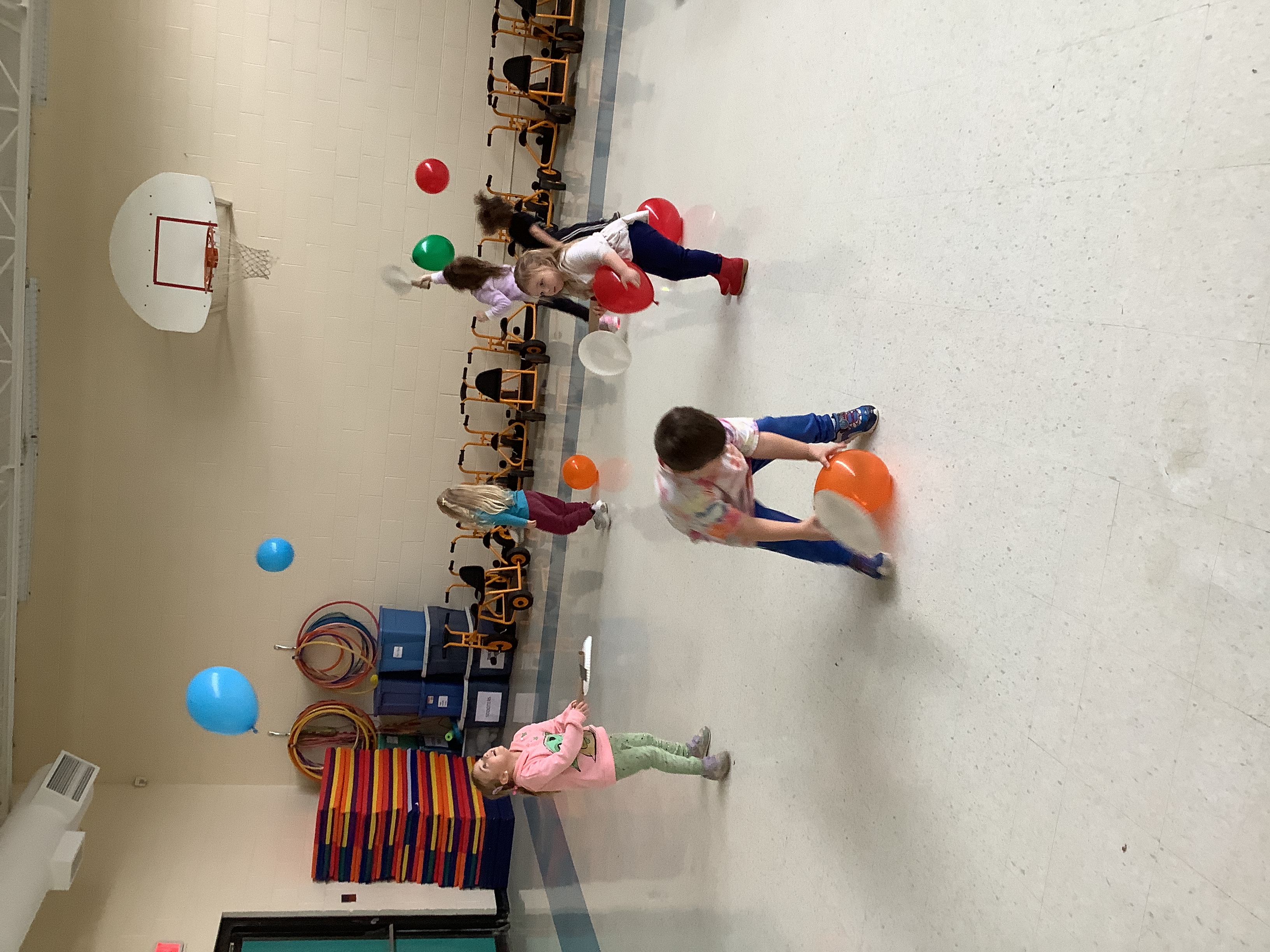 playing with balloons in the gym