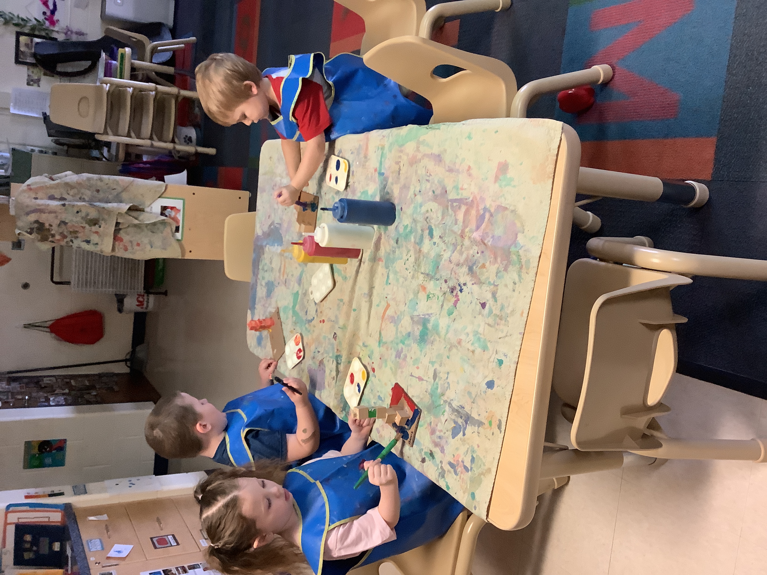 painting at the art table together