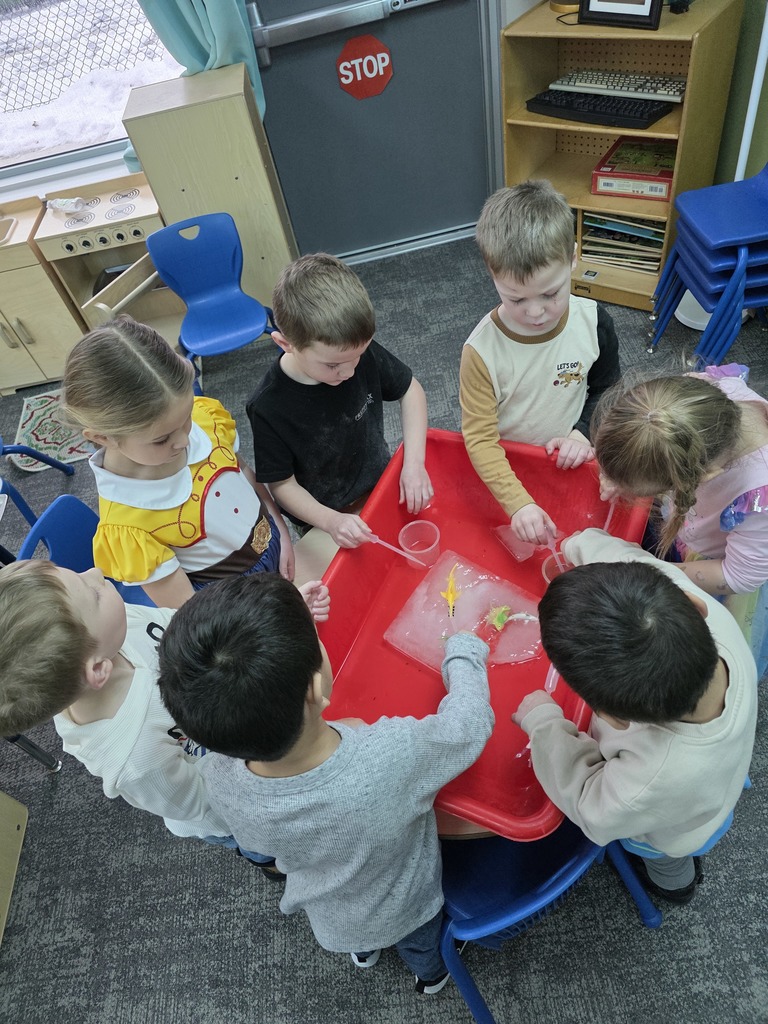 Students at a water table
