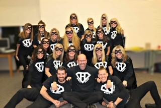 Picture of Hyatt staff wearing black Hyatt Hero shirts. 
