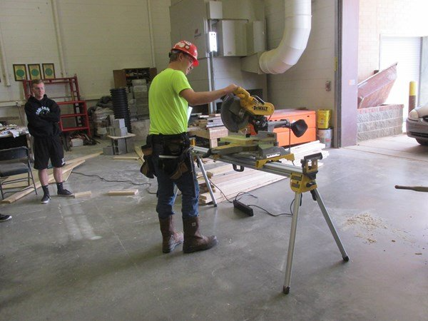 Student using a power saw