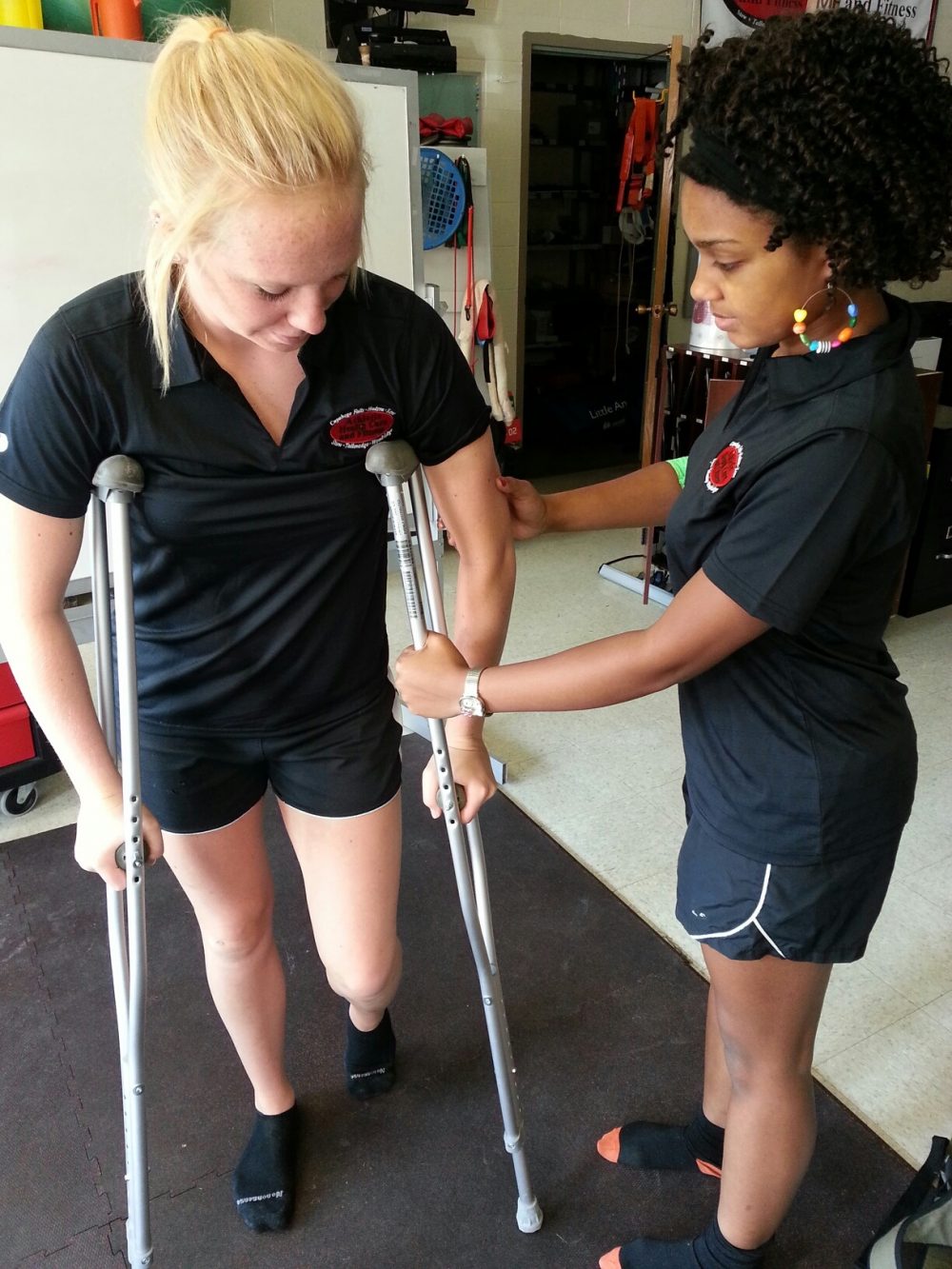 A student working with crutches
