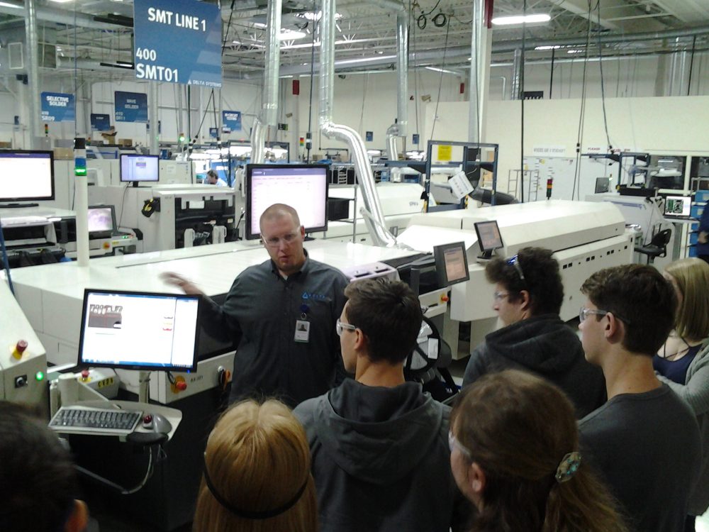 Students touring Delta Systems