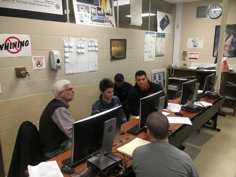 Students working together on a computer