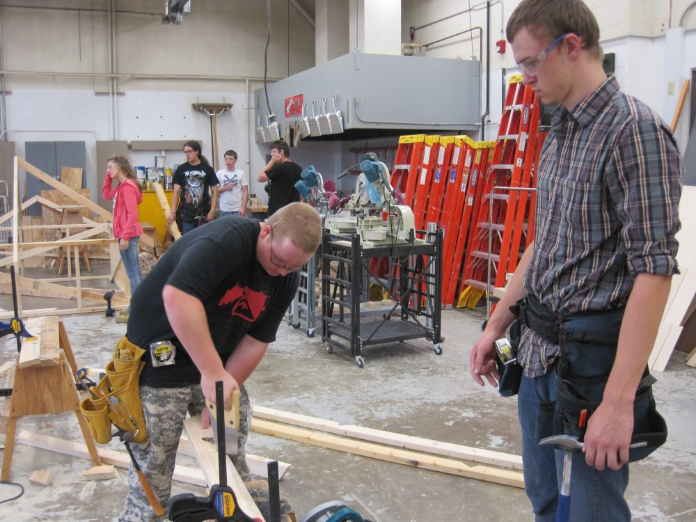 Construction students working in a lab