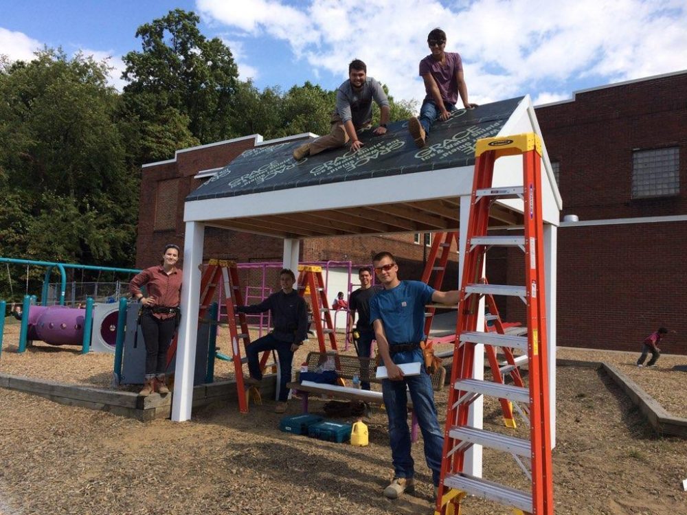 Construction students working on the pavilion