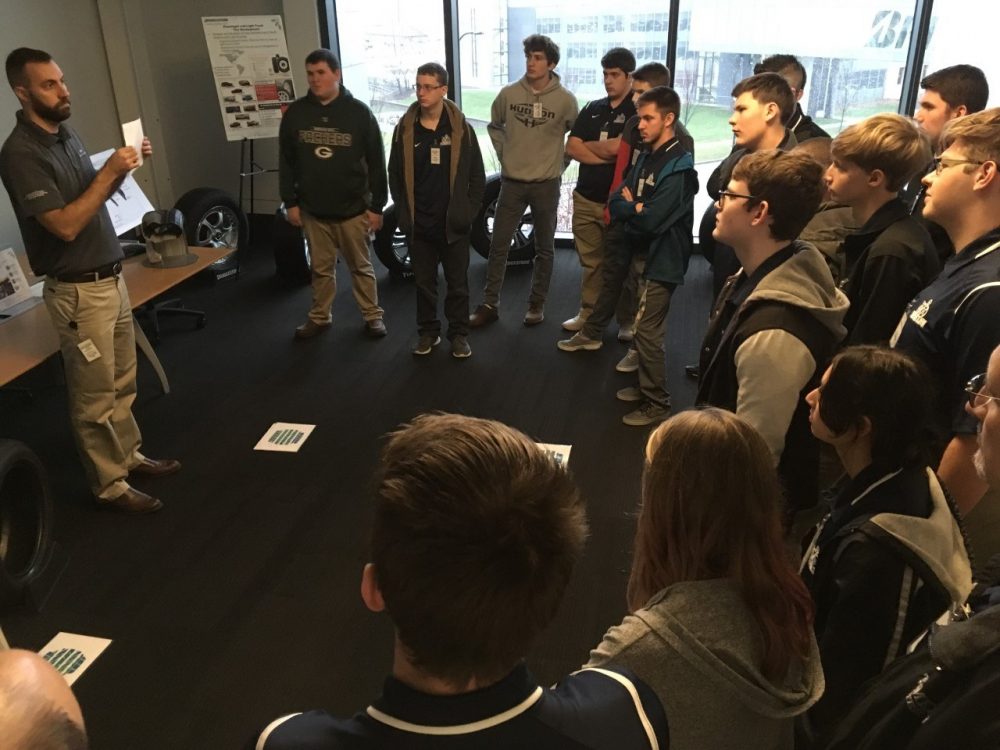 Students listening to a presenter