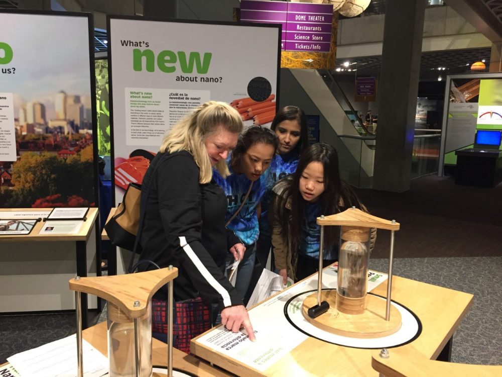 Students looking at a display together