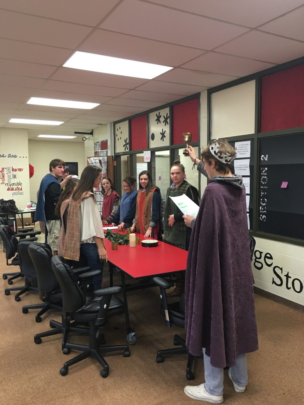 Students role playing with medieval outfits
