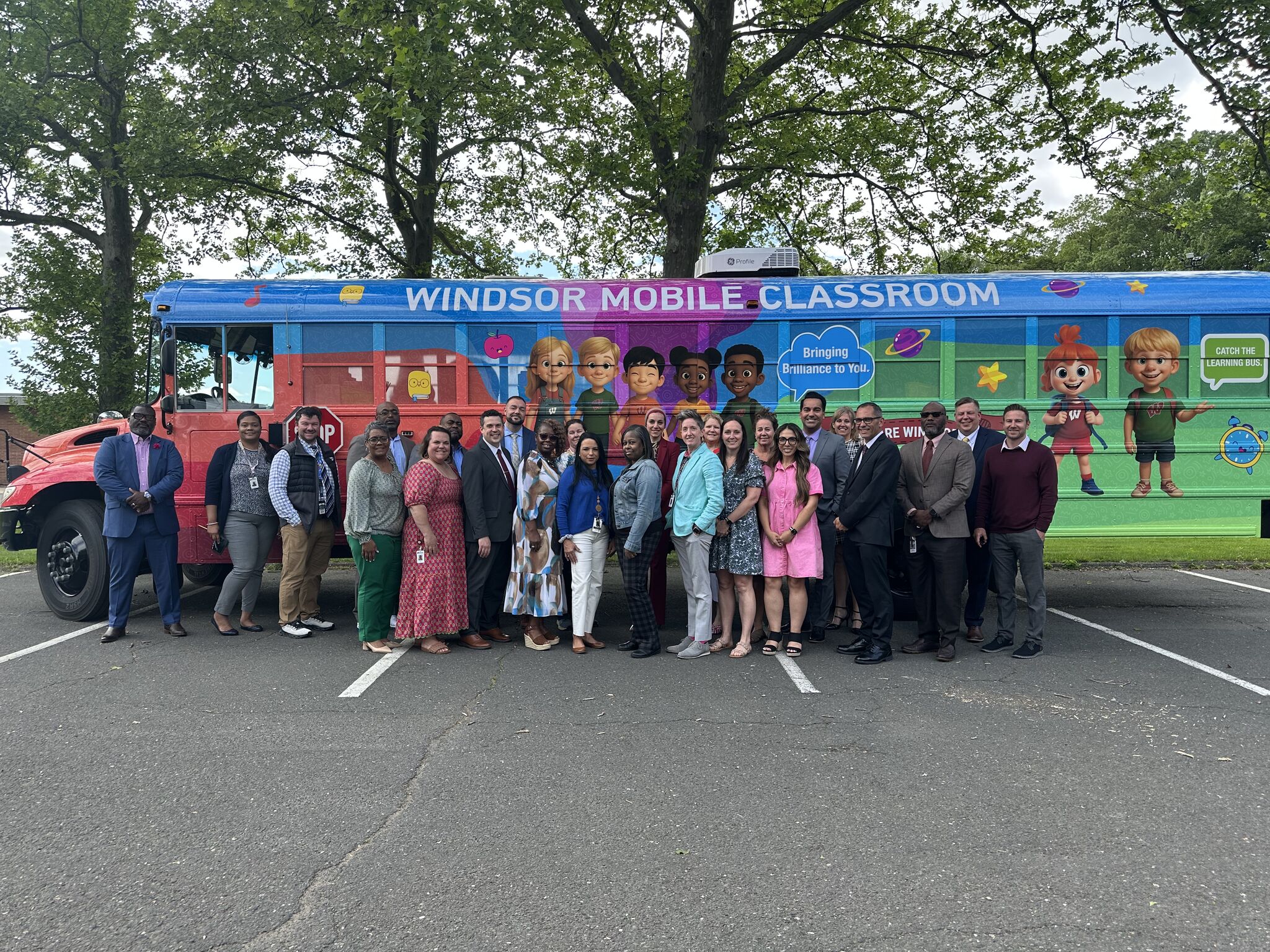 Administrators in front of Mobile Classroom