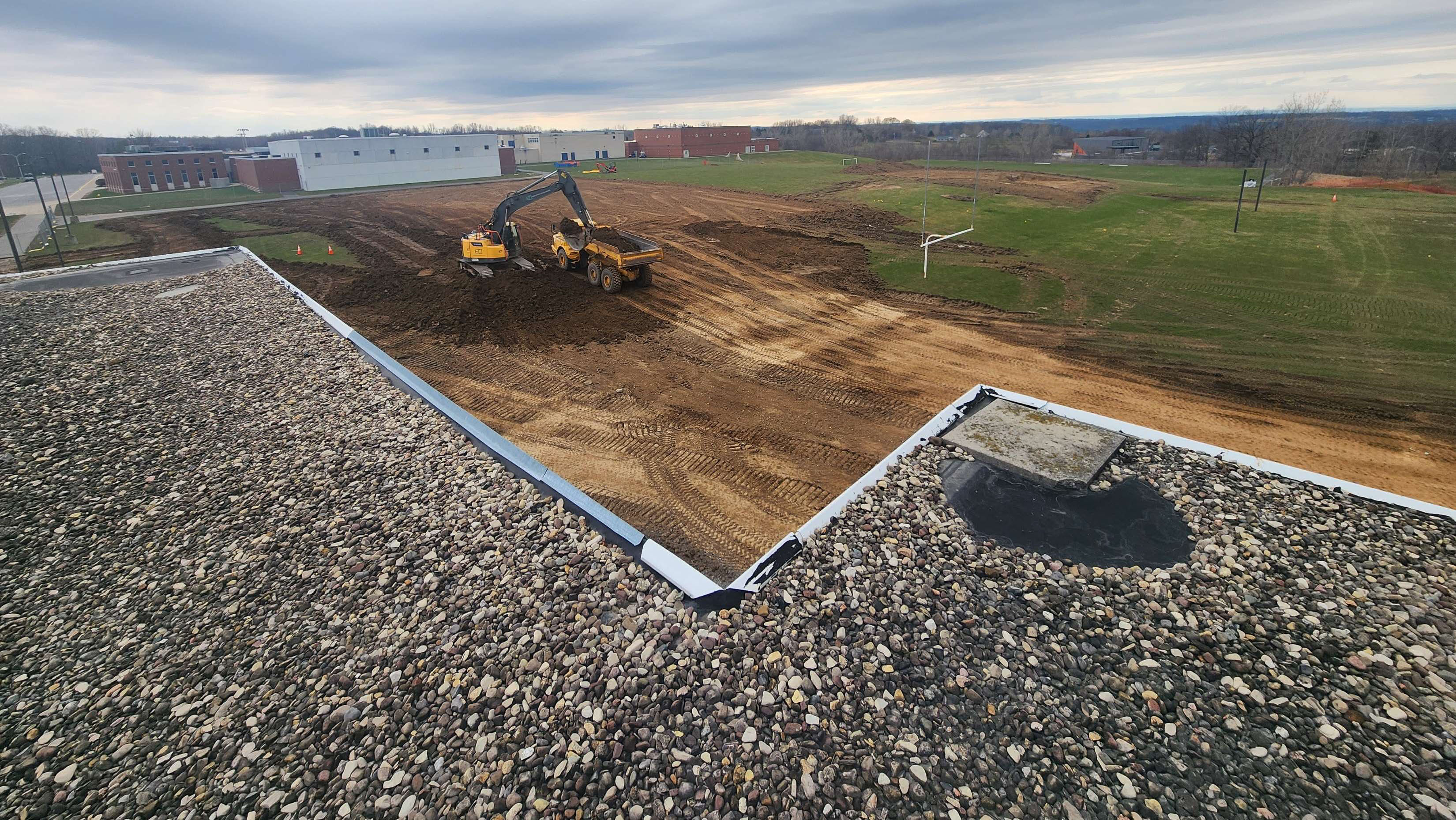 stripping of topsoil on the upper field.