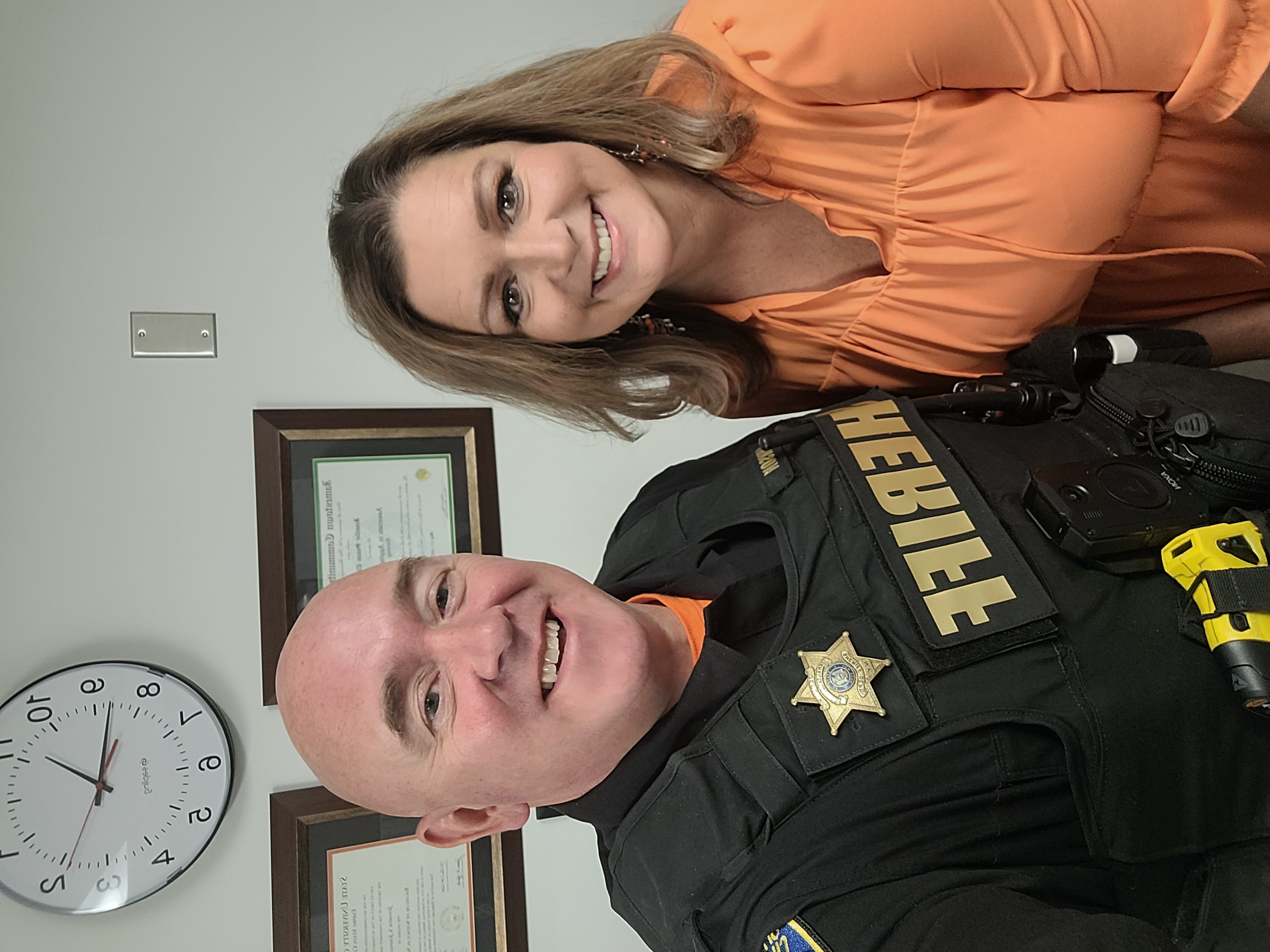 Deputy & Nurse Johnson wear orange for Unity Day