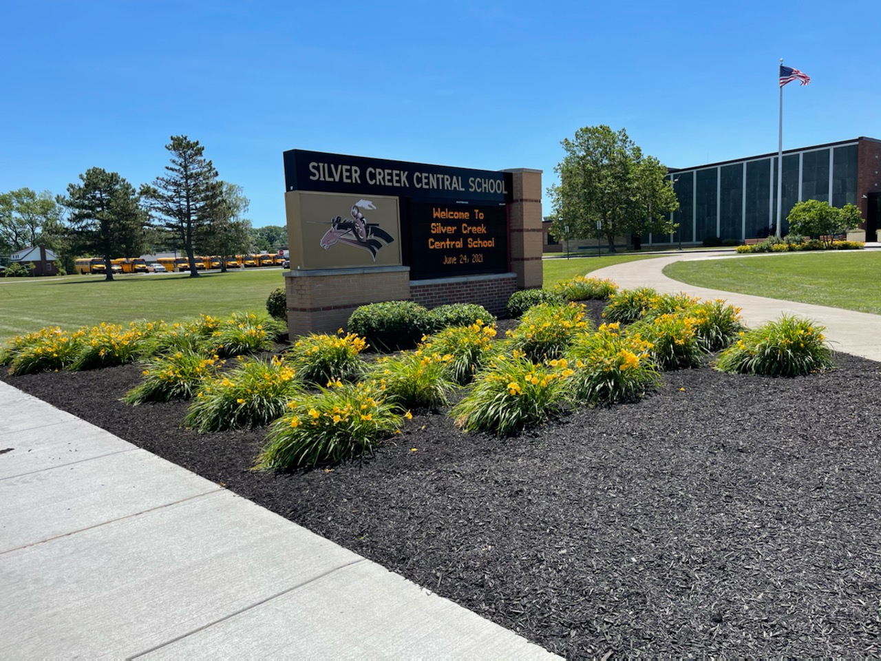 Digital sign and manicured landscaping on the campus of Silver Creek CSD