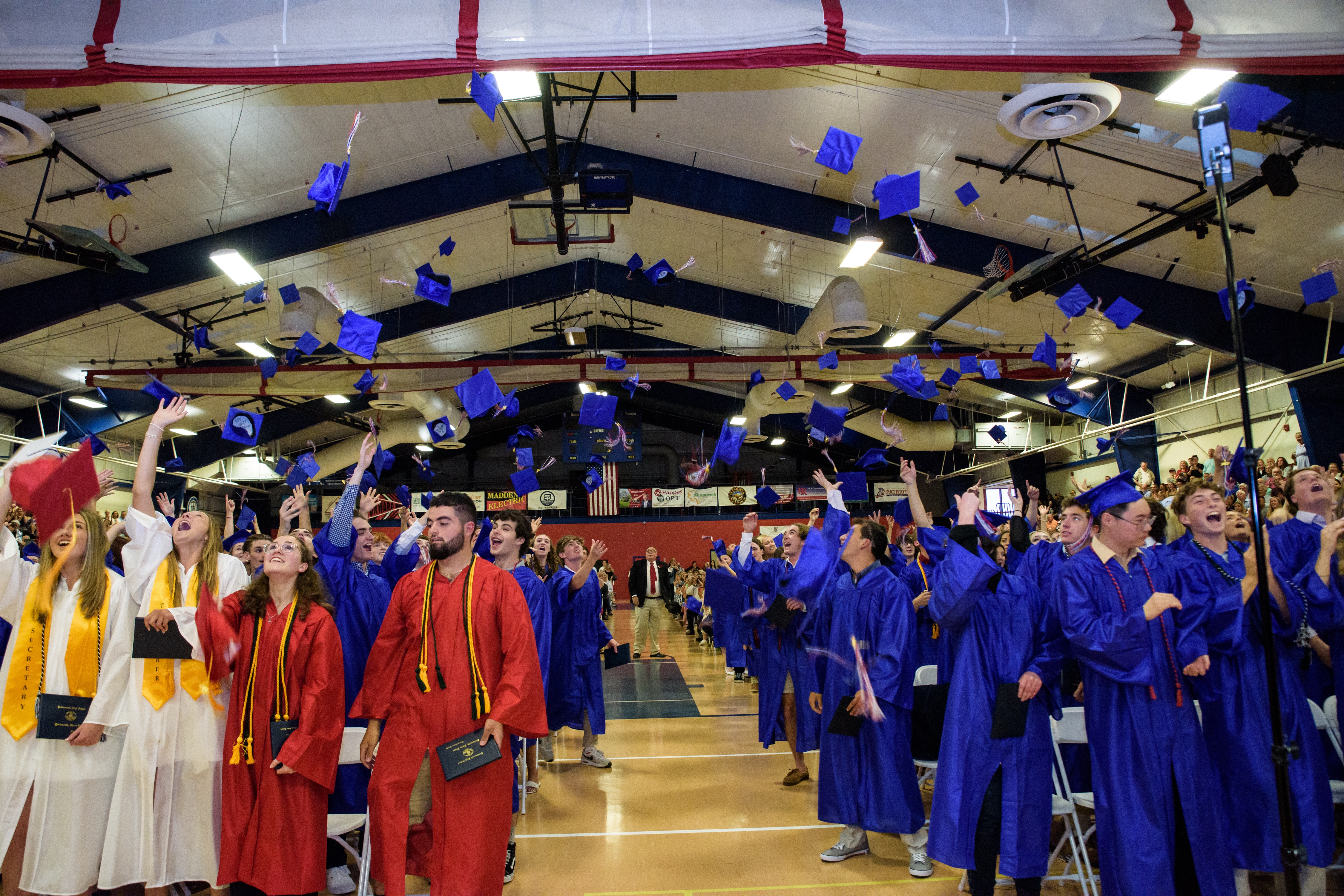 Graduates Tossing Caps at Graduation