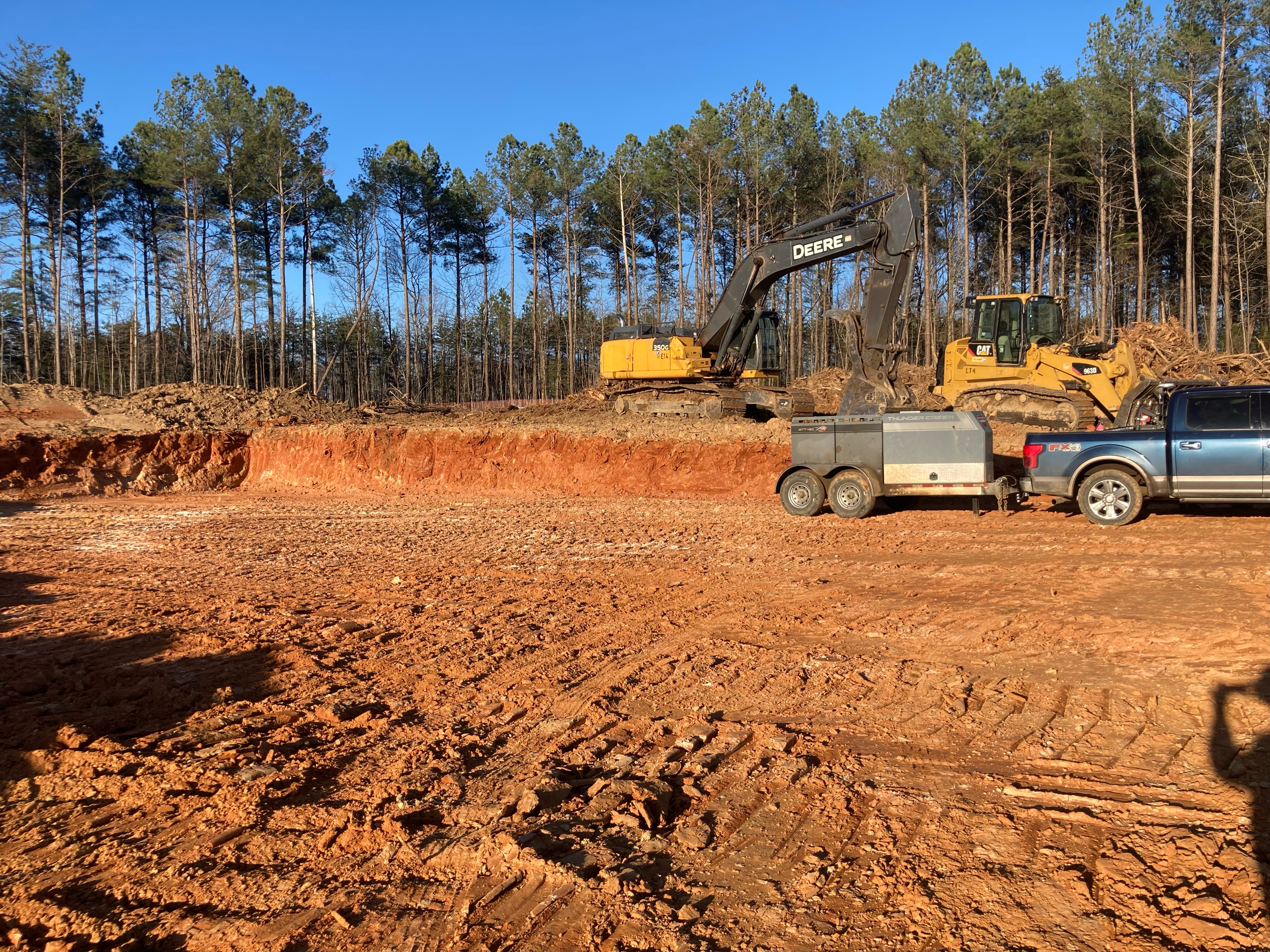 Image of land cleared for future building pad