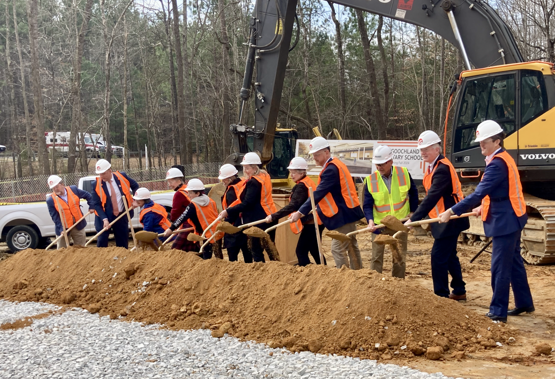 Officials shovel dirt at Groundbreaking Ceremony