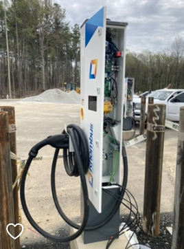 Electric bus chargers installed in school bus loop