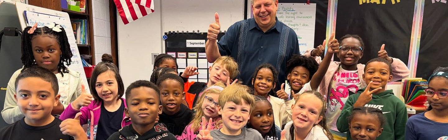 Students with Principal Gruber August 2025