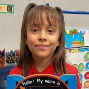 Female elementary student, smiling