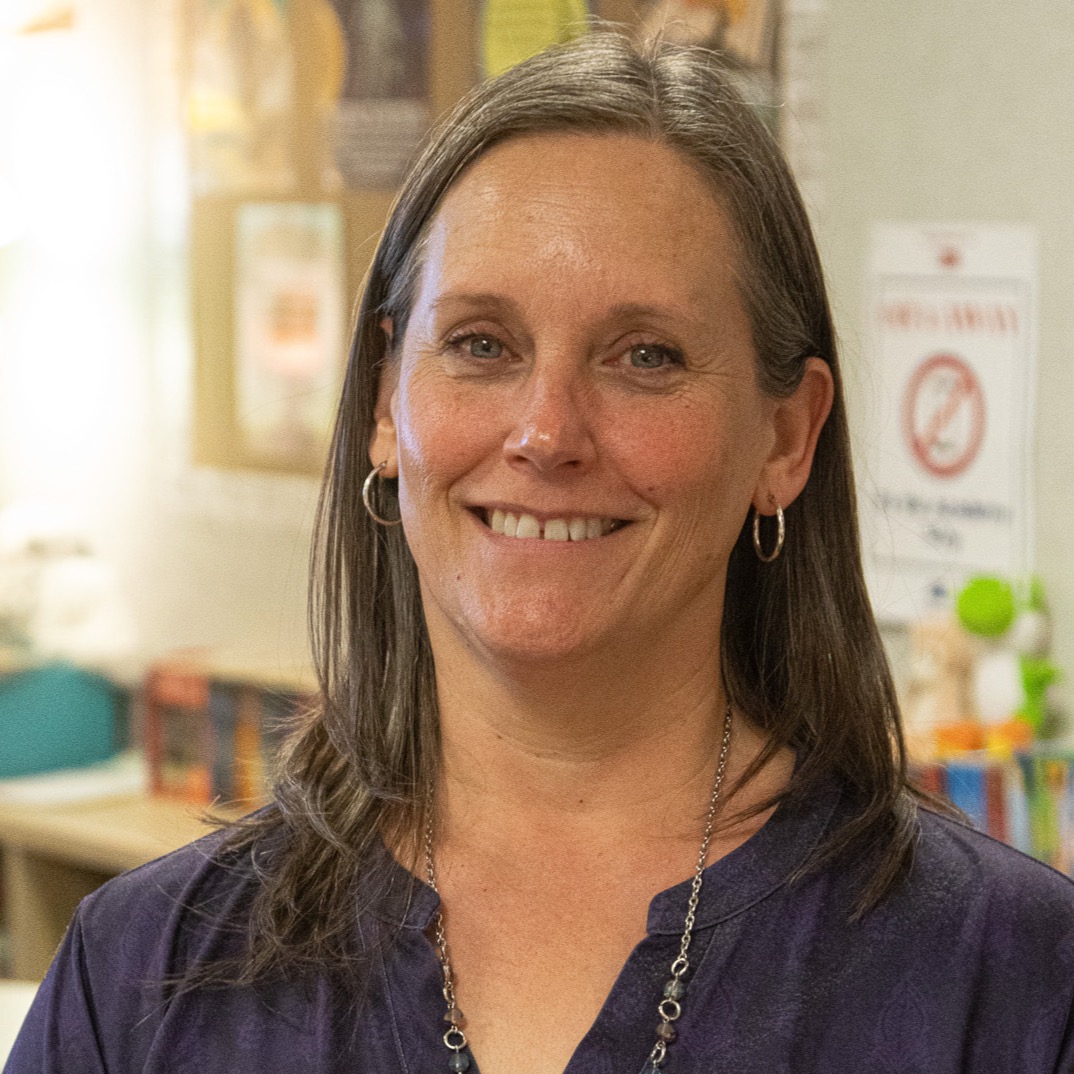 Teacher poses for portrait