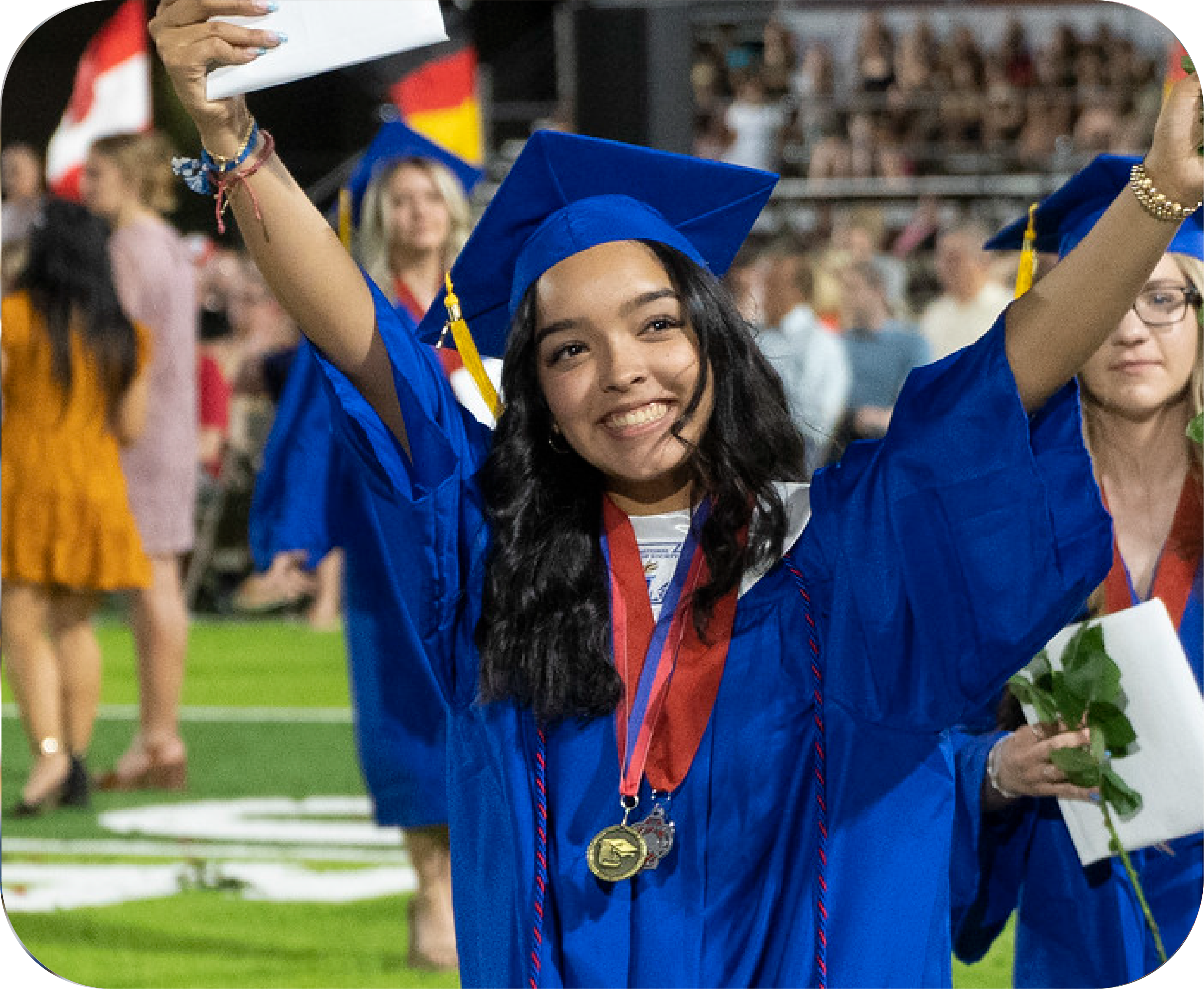 student celebrating at graduation