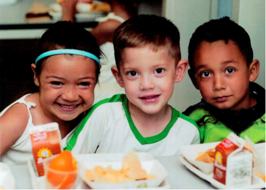 students sitting at lunch table