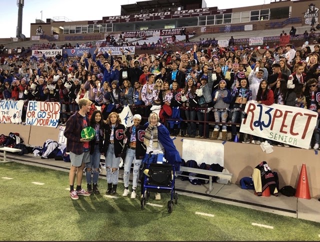 Young students in bleachers