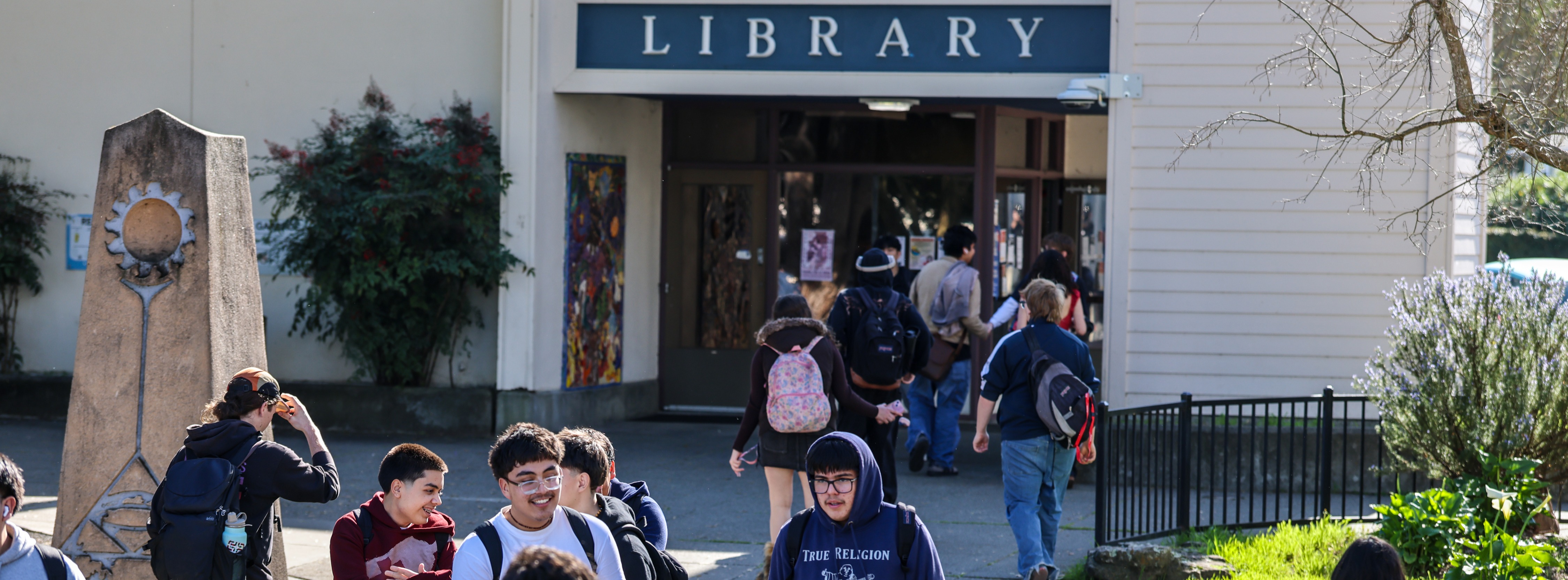 Students walking to and from the library