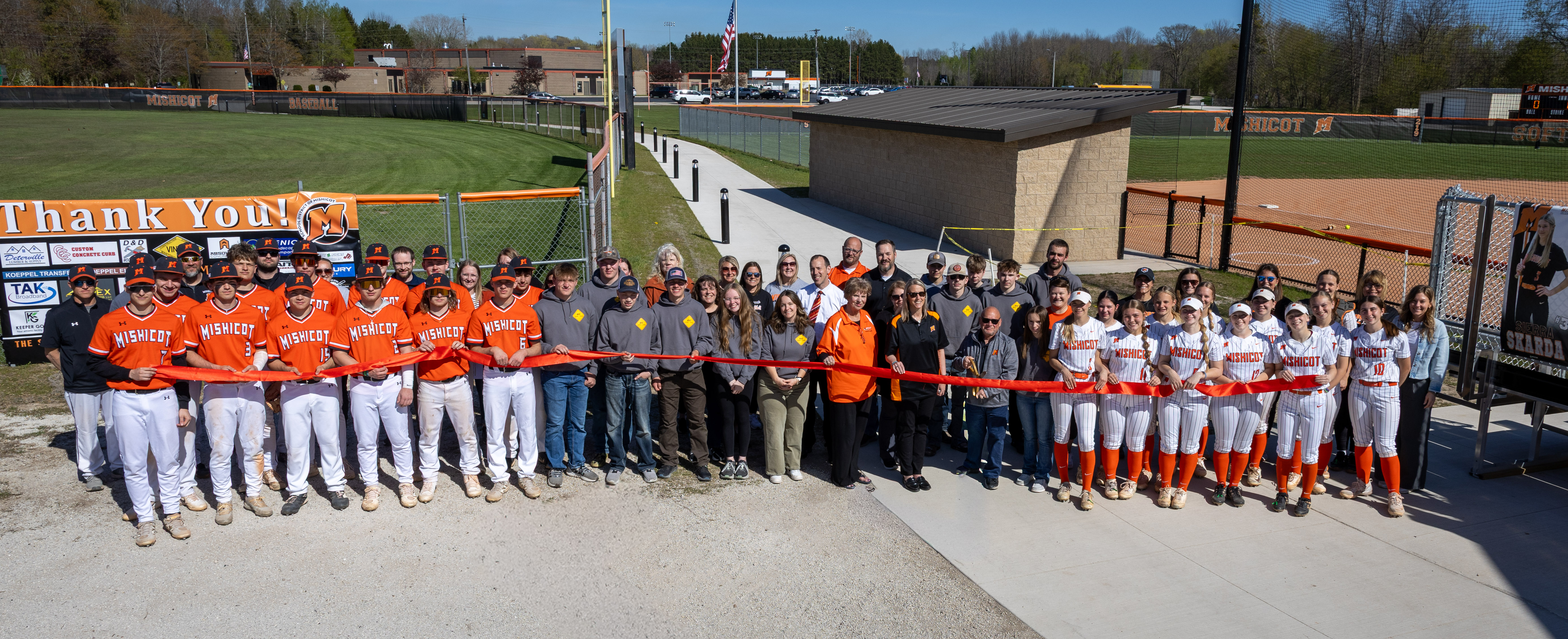 Softball, Baseball Teams and Geometry in Construction Students Ribbon Cutting