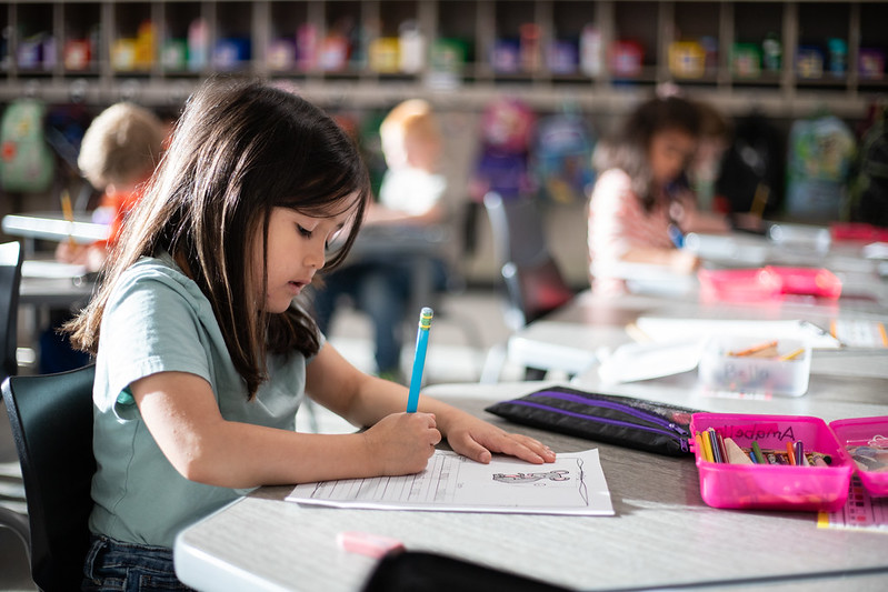 student working at desk
