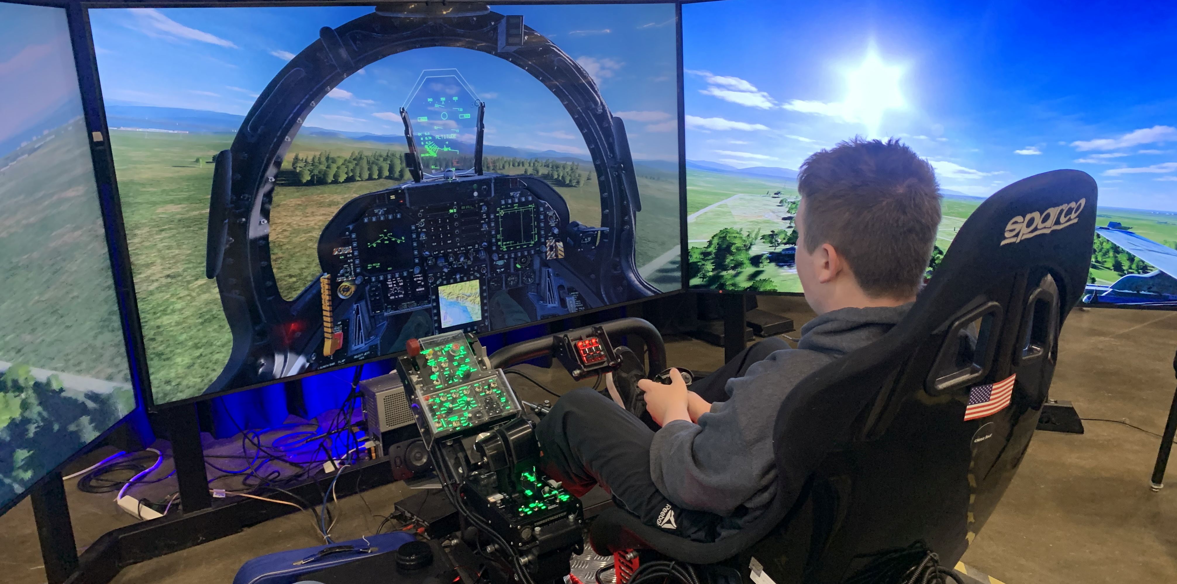 Student flies F-18 Simulator