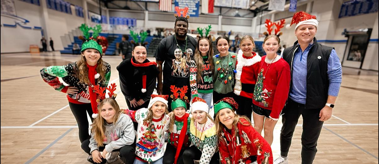 JH Basketball girls with holiday gear